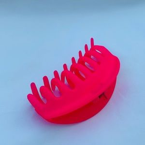 Bright pink hair claw clip.
